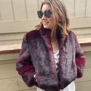 Vintage faux fur rich red/black cropped jacket brand is 24k.